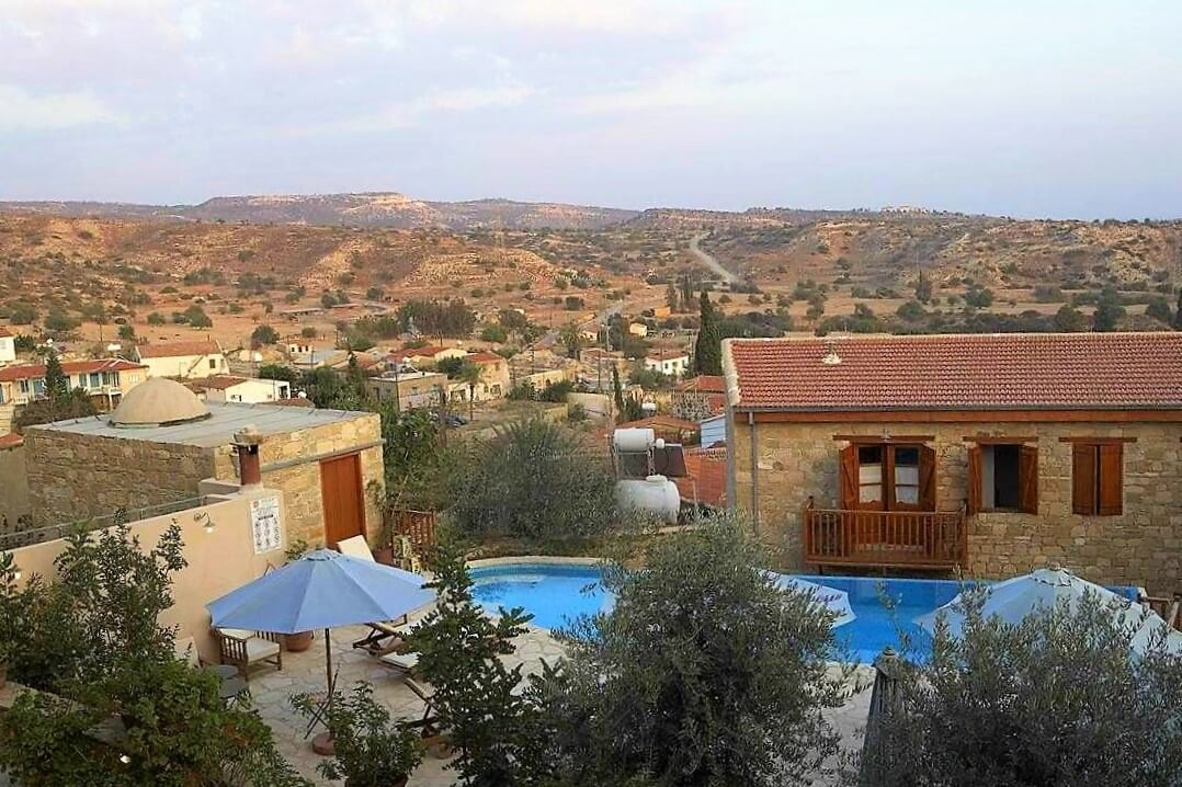 eveleos hotel pool and land view