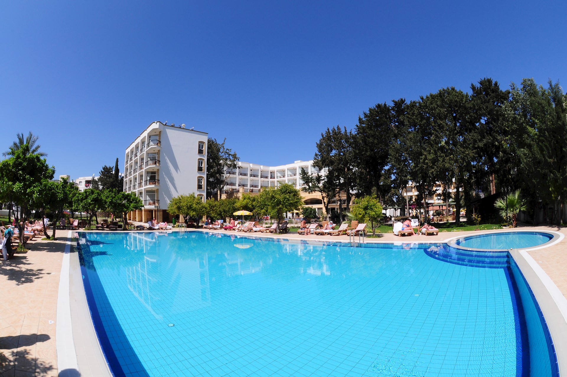 Lush Gardens with Two Swimming Pools