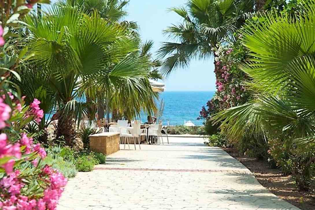 akti beach village resort walkway